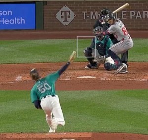 An image of Bryce Miller throwing a fastball timed to when the ball is released. His arm is in a visibly different position at release from the other image.