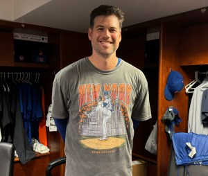 Adam Ottavino wears a very cool Mets t-shirt. The pitcher is a skeleton in a Mets uniform. It was personalized too.