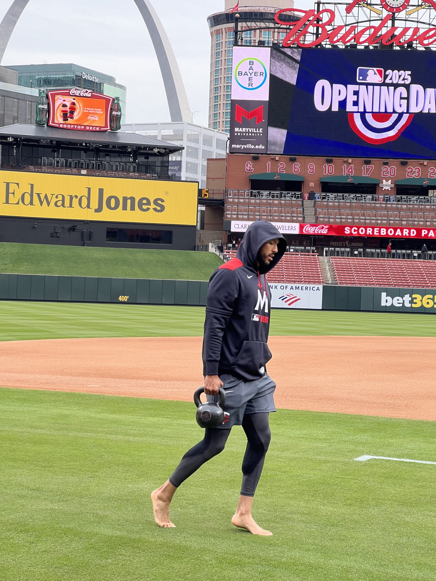 Twins star Carlos Correa walks barefoot and carries a 20-pound weight to prepare for Opening Day in March 2025.
